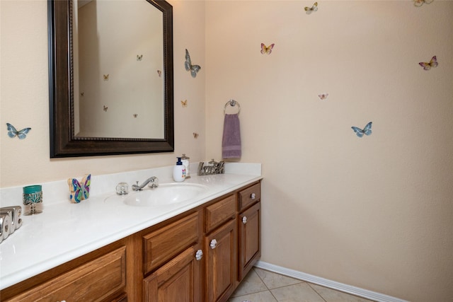 516 Hazelnut Ct, Saginaw, TX 76179 - bathroom with vanity, tile patterned floors, and baseboards