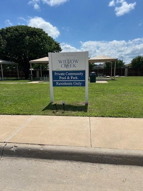 516 Hazelnut Ct, Saginaw, TX 76179 - community / neighborhood sign featuring a yard