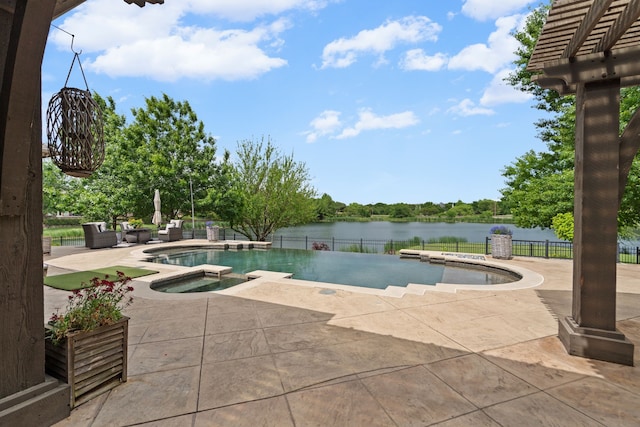1005 Forest Lake Cir, Mckinney, TX 75072 - view of swimming pool featuring a water view, a patio area, fence, and a pool with connected hot tub
