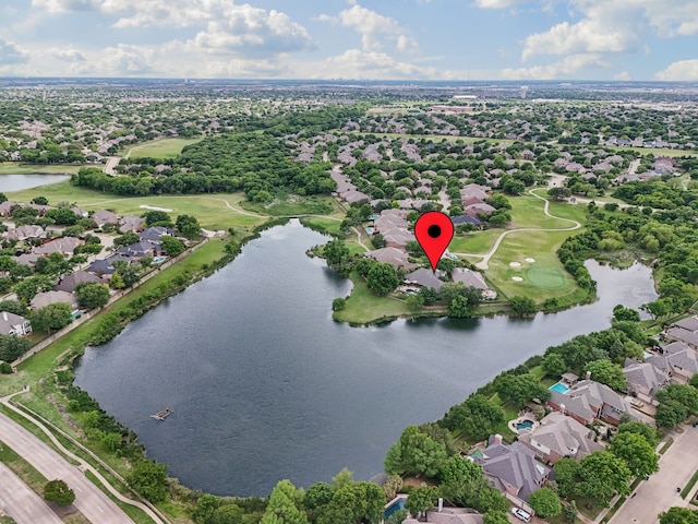 birds eye view of property featuring a residential view, view of golf course, and a water view
