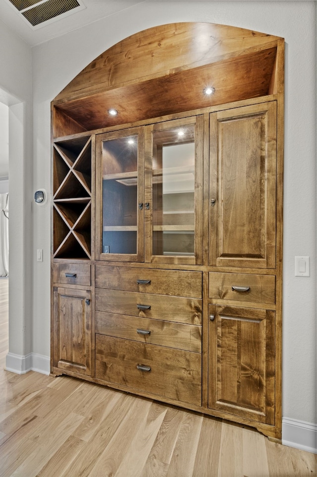 1005 Forest Lake Cir, Mckinney, TX 75072 - detailed view of wood finished floors and baseboards
