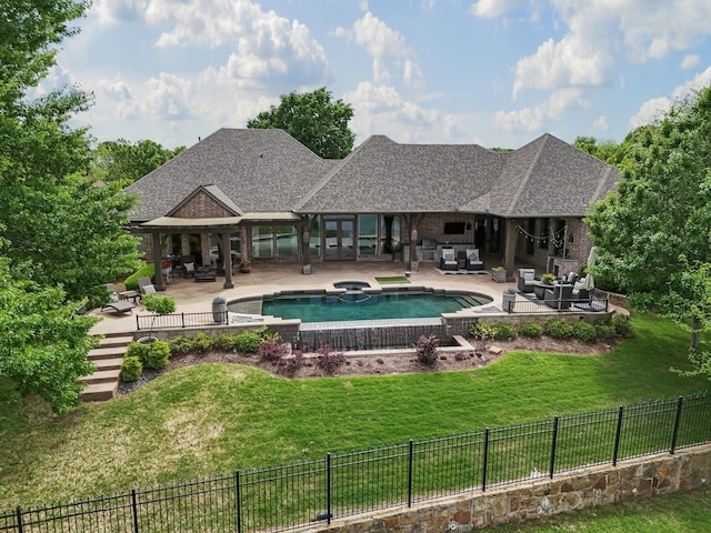 view of swimming pool featuring a fenced backyard, a patio, an outdoor living space, and french doors