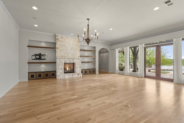 1005 Forest Lake Cir, Mckinney, TX 75072 - unfurnished living room featuring crown molding, a chandelier, built in features, recessed lighting, and light wood-style flooring
