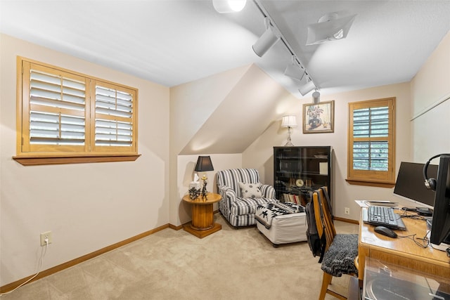office area with baseboards, carpet flooring, and rail lighting