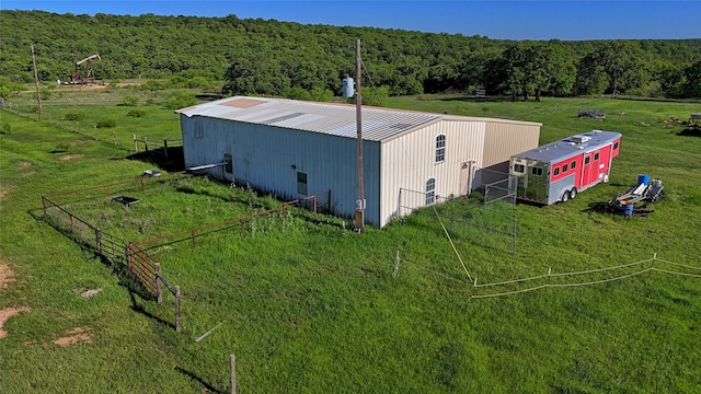 bird's eye view featuring a rural view and a view of trees