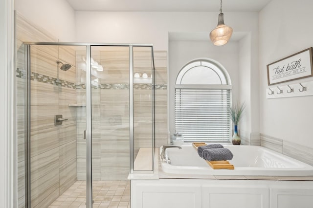 13002 Clarendon Dr, Frisco, TX 75035 - bathroom featuring a garden tub and a shower stall
