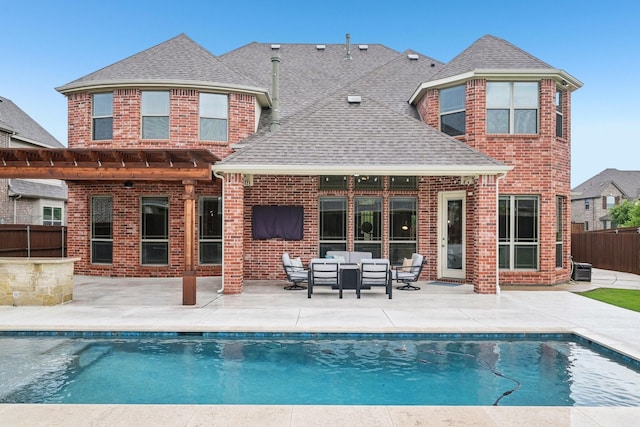 13002 Clarendon Dr, Frisco, TX 75035 - rear view of property with a patio area, roof with shingles, fence, and brick siding