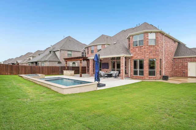 13002 Clarendon Dr, Frisco, TX 75035 - back of house featuring a patio area, brick siding, a shingled roof, and a fenced backyard
