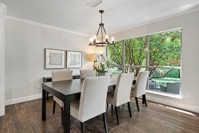 6726 Williamson Rd, Dallas, TX 75214 - dining room with a chandelier, crown molding, baseboards, and wood finished floors