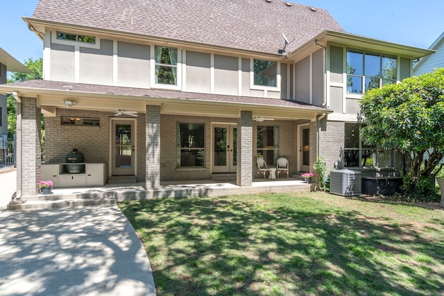 6726 Williamson Rd, Dallas, TX 75214 - rear view of house with a patio area, cooling unit, a yard, brick siding, and area for grilling