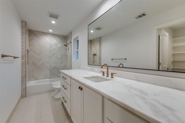 bathroom featuring toilet, visible vents, and vanity