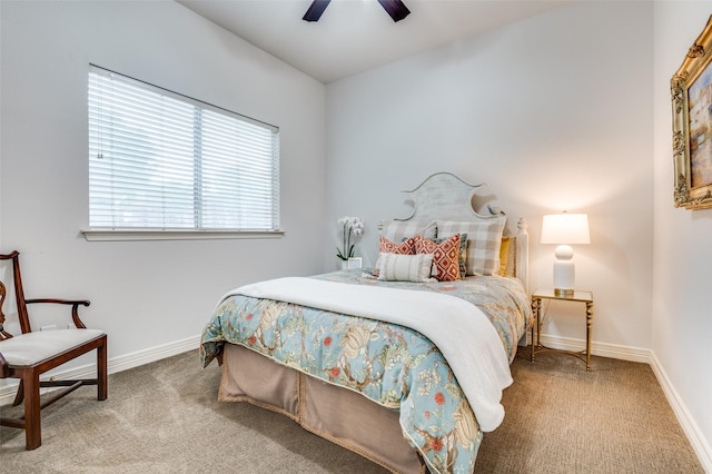 bedroom featuring a ceiling fan, baseboards, and carpet floors