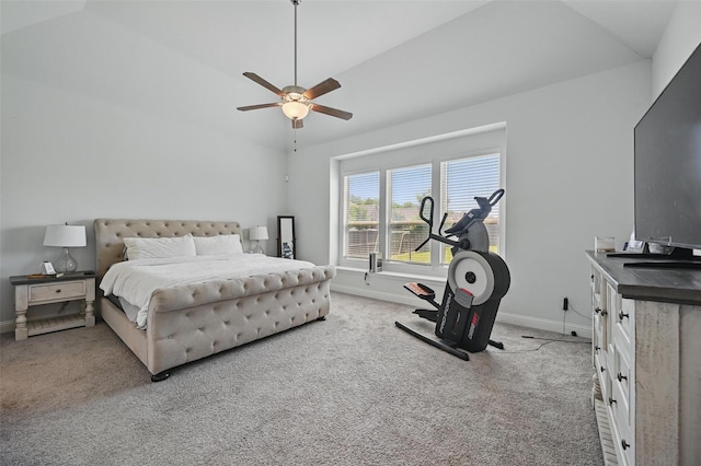 bedroom featuring lofted ceiling, baseboards, and carpet