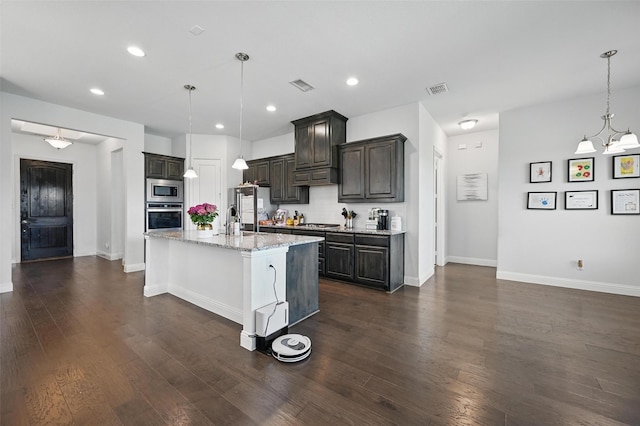kitchen with baseboards, appliances with stainless steel finishes, and dark wood-style floors