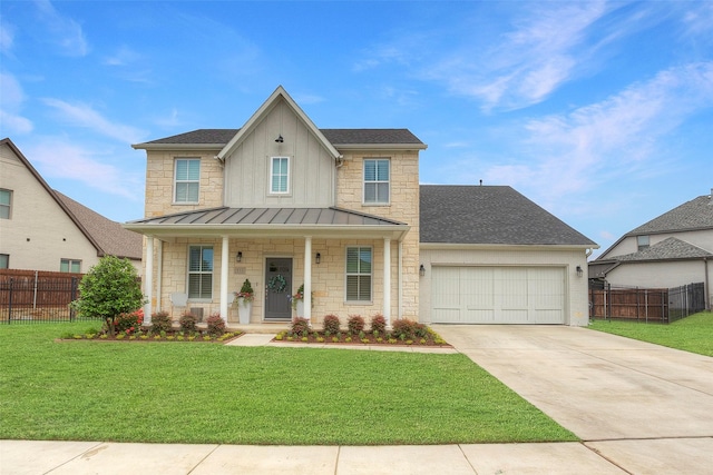 view of front of property featuring a standing seam roof, a porch, stone siding, fence, and a garage
