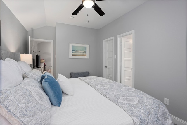 bedroom featuring lofted ceiling and ceiling fan