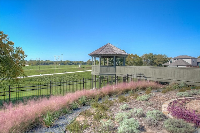 view of yard featuring a gazebo and fence