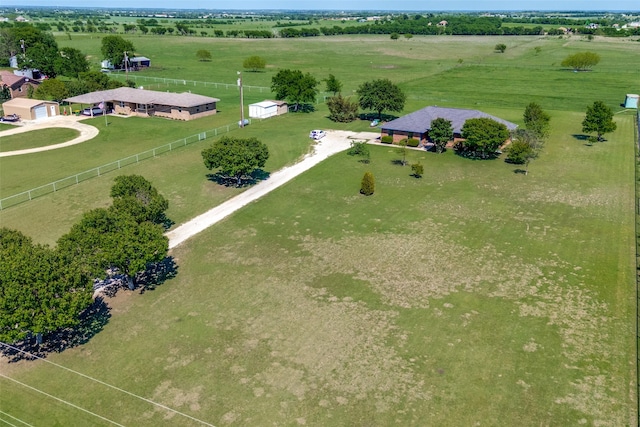 birds eye view of property featuring a rural view