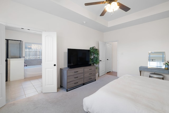 230 Heatherstone Dr, Midlothian, TX 76065 - bedroom featuring light carpet, ensuite bathroom, light tile patterned floors, and a ceiling fan