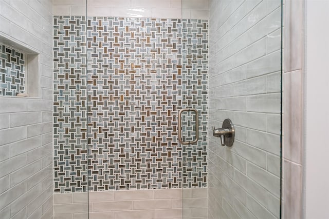 bathroom featuring a shower stall