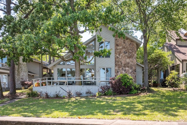 view of home's exterior with a lawn