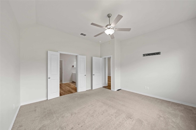 14825 Turtle Creek Ranch Rd, Flint, TX 75762 - unfurnished bedroom featuring carpet, baseboards, ceiling fan, and a high ceiling