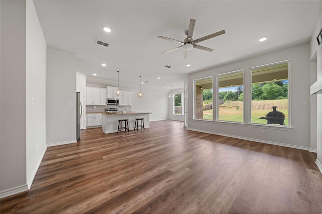 14825 Turtle Creek Ranch Rd, Flint, TX 75762 - unfurnished living room with a ceiling fan, dark wood finished floors, baseboards, a sink, and recessed lighting