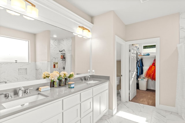 4114 Seminole Trl, Granbury, TX 76048 - full bath featuring marble finish floors, toilet, double vanity, baseboards, and a shower