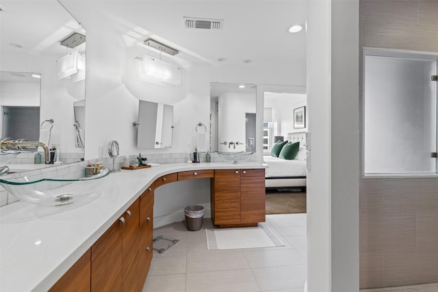 bathroom featuring tile patterned floors, visible vents, recessed lighting, and vanity