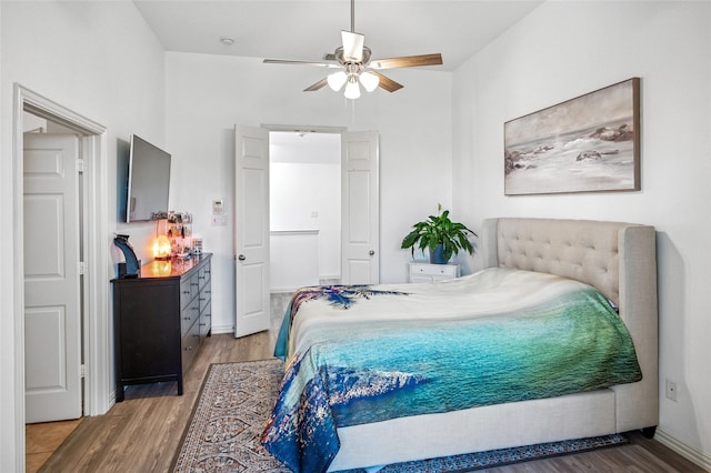 bedroom featuring wood finished floors and ceiling fan
