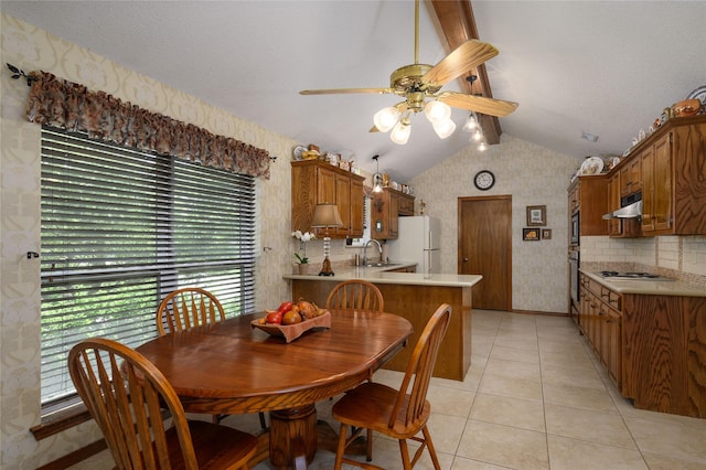 401 Cove Cir, Mckinney, TX 75071 - kitchen with a sink, stainless steel appliances, wallpapered walls, under cabinet range hood, and visible vents