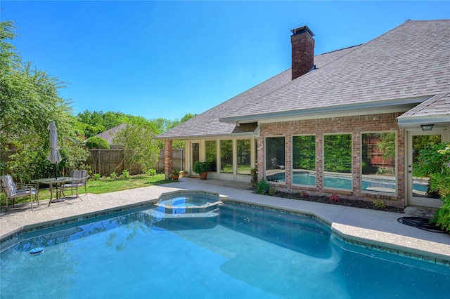 401 Cove Cir, Mckinney, TX 75071 - view of swimming pool featuring a pool with connected hot tub, fence, and a patio area