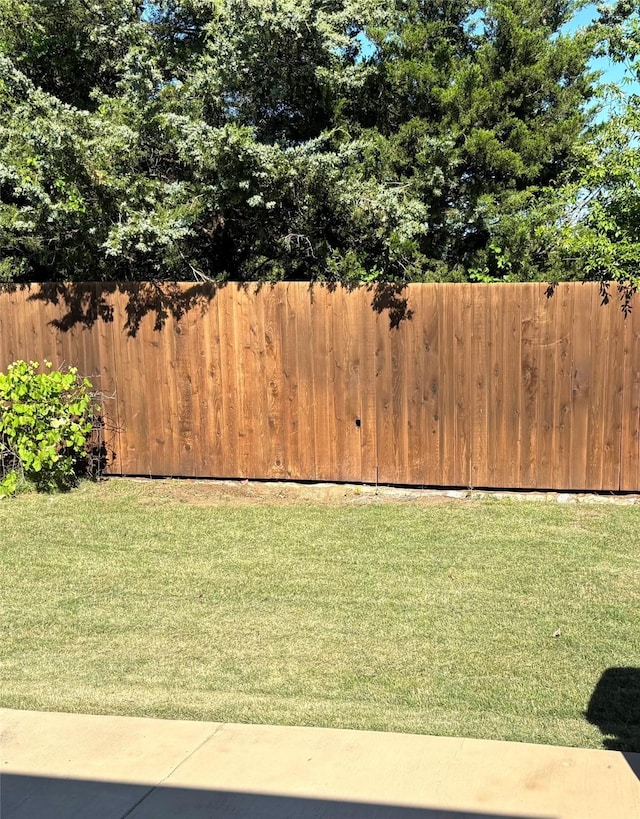 view of yard with fence