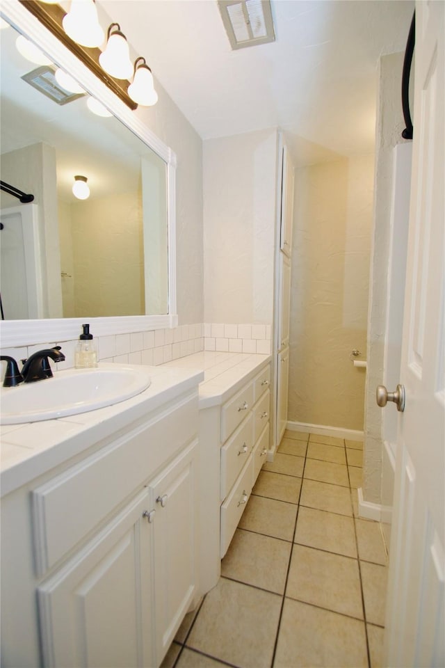 416 Rolling Hills Dr, Aledo, TX 76008 - bathroom featuring vanity, tile patterned flooring, and baseboards