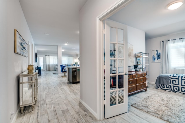 527 Whitney Ln, Lavon, TX 75166 - hall with baseboards, french doors, and wood finished floors