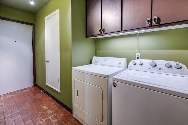 5713 Pershing Ave, Fort Worth, TX 76107 - washroom with cabinet space, independent washer and dryer, and brick floor