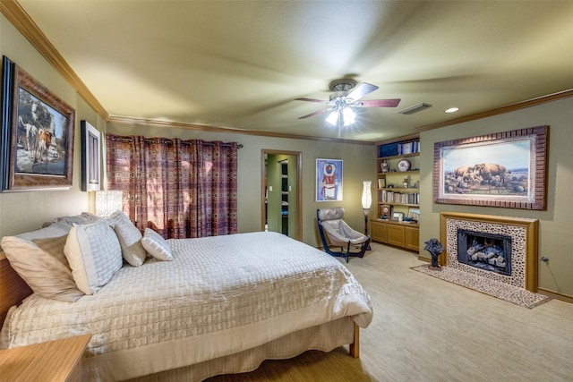 5713 Pershing Ave, Fort Worth, TX 76107 - bedroom with ceiling fan, light carpet, a tiled fireplace, ornamental molding, and visible vents