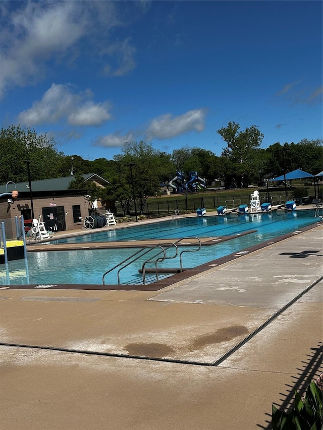 405 Davis St, Weatherford, TX 76086 - community pool with a patio area and fence