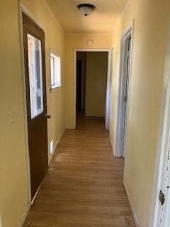 hall with light wood finished floors
