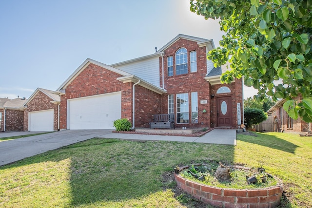 traditional-style house featuring brick siding, an attached garage, a front yard, and concrete driveway