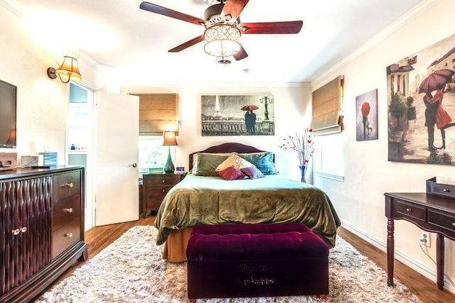 717 Cliffside Dr, Richardson, TX 75080 - bedroom featuring ornamental molding, wood finished floors, and a ceiling fan