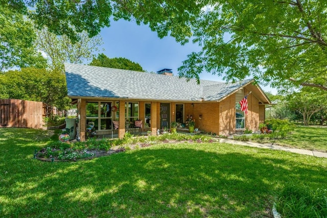 717 Cliffside Dr, Richardson, TX 75080 - ranch-style house with a chimney, brick siding, and roof with shingles