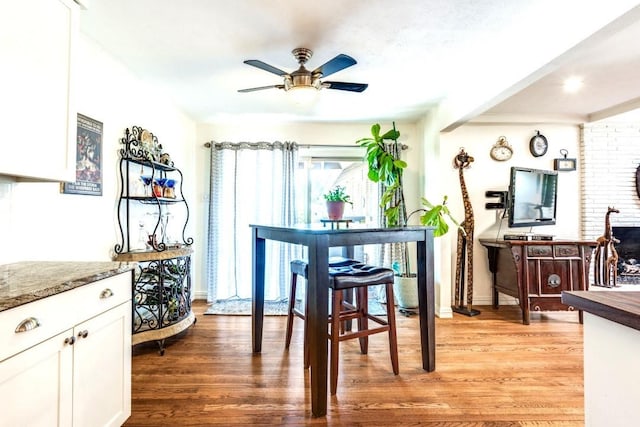 717 Cliffside Dr, Richardson, TX 75080 - dining room with light wood-type flooring, ceiling fan, and baseboards