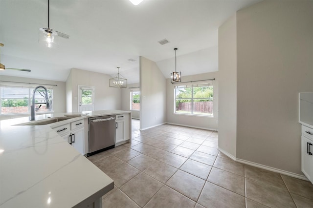 kitchen with a sink, a chandelier, dishwasher, lofted ceiling, and visible vents