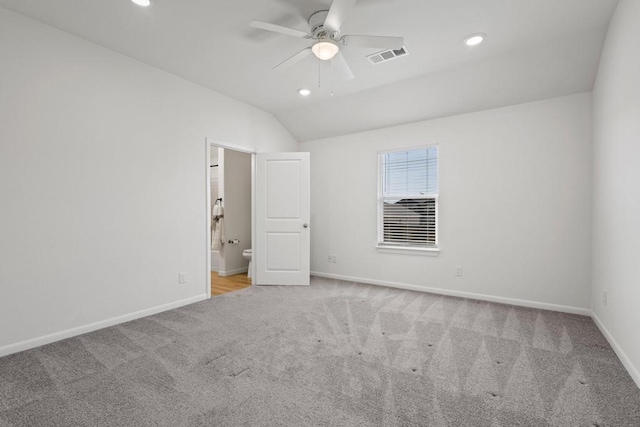 carpeted empty room featuring recessed lighting, a ceiling fan, lofted ceiling, and baseboards