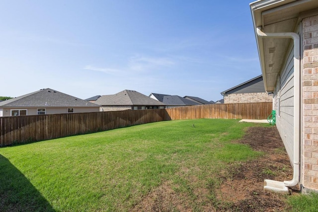 view of yard featuring a fenced backyard