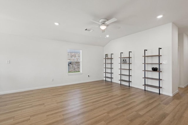 empty room with recessed lighting, a ceiling fan, light wood-style flooring, and baseboards
