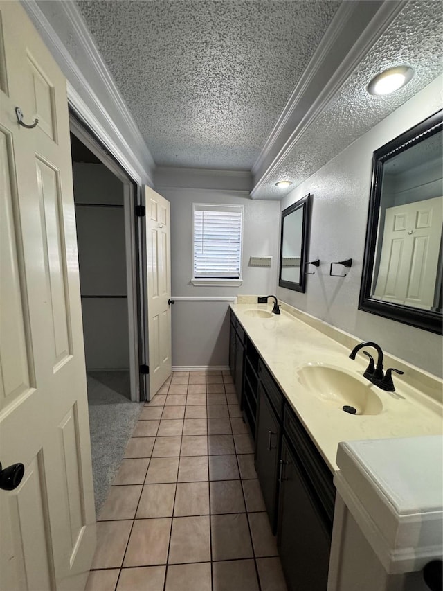 3401 89th St, Lubbock, TX 79423 - full bath with a textured ceiling, ornamental molding, double vanity, and tile patterned floors