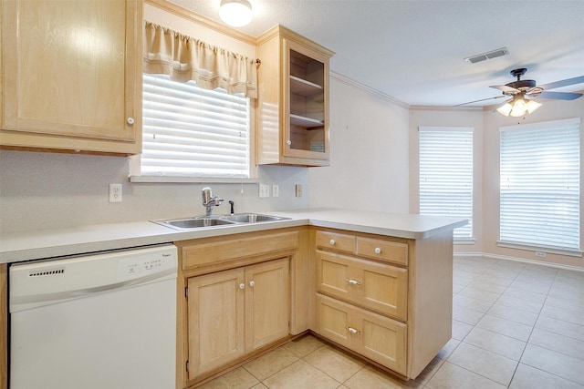 kitchen featuring dishwasher, visible vents, and light brown cabinets