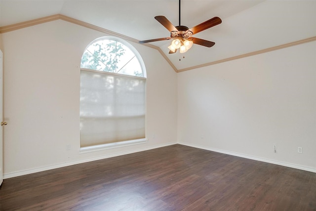 unfurnished room with lofted ceiling, wood finished floors, baseboards, and ceiling fan